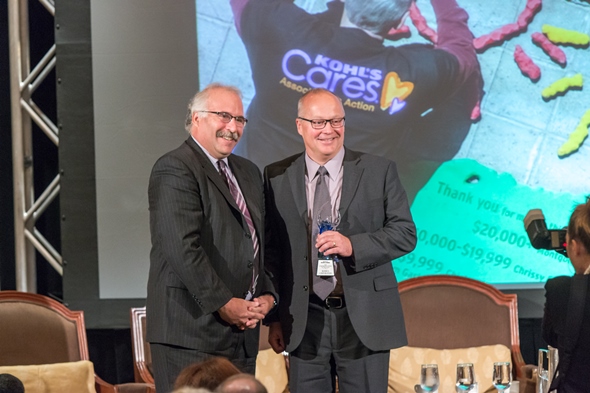 Richard Schepp accepts the Corporate Citizen of the Year award on Kohl’s behalf